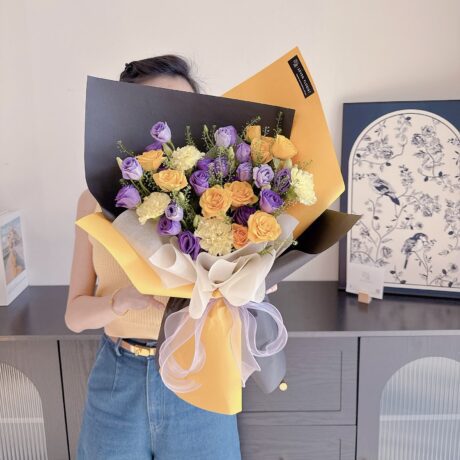 Dark purple eustoma yellow rose hand bouquet Seven Florist birthday gift