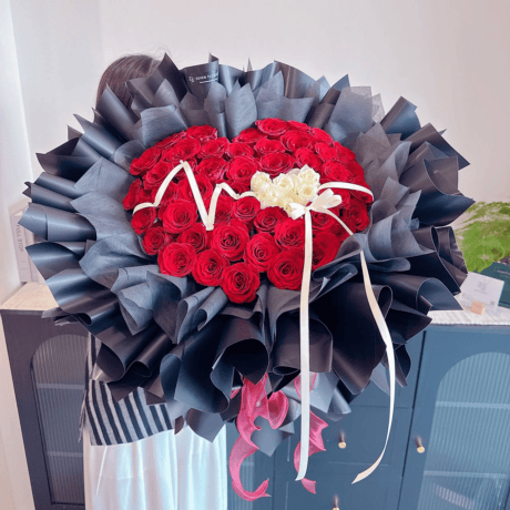 52 red and white rose hand bouquet anniversary gift Seven Florist