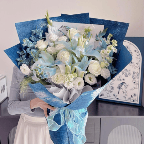 Blue lily and white rose hand bouquet Frost Tide by Seven Florist Puchong