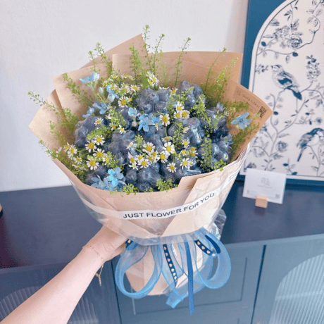 Fresh blueberry and oxypetalum gift arrangement for birthday or get-well Seven Florist