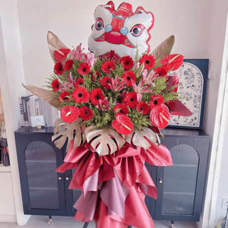 Red gerbera anthurium congratulations flower stand with lion head balloon Seven Florist Puchong