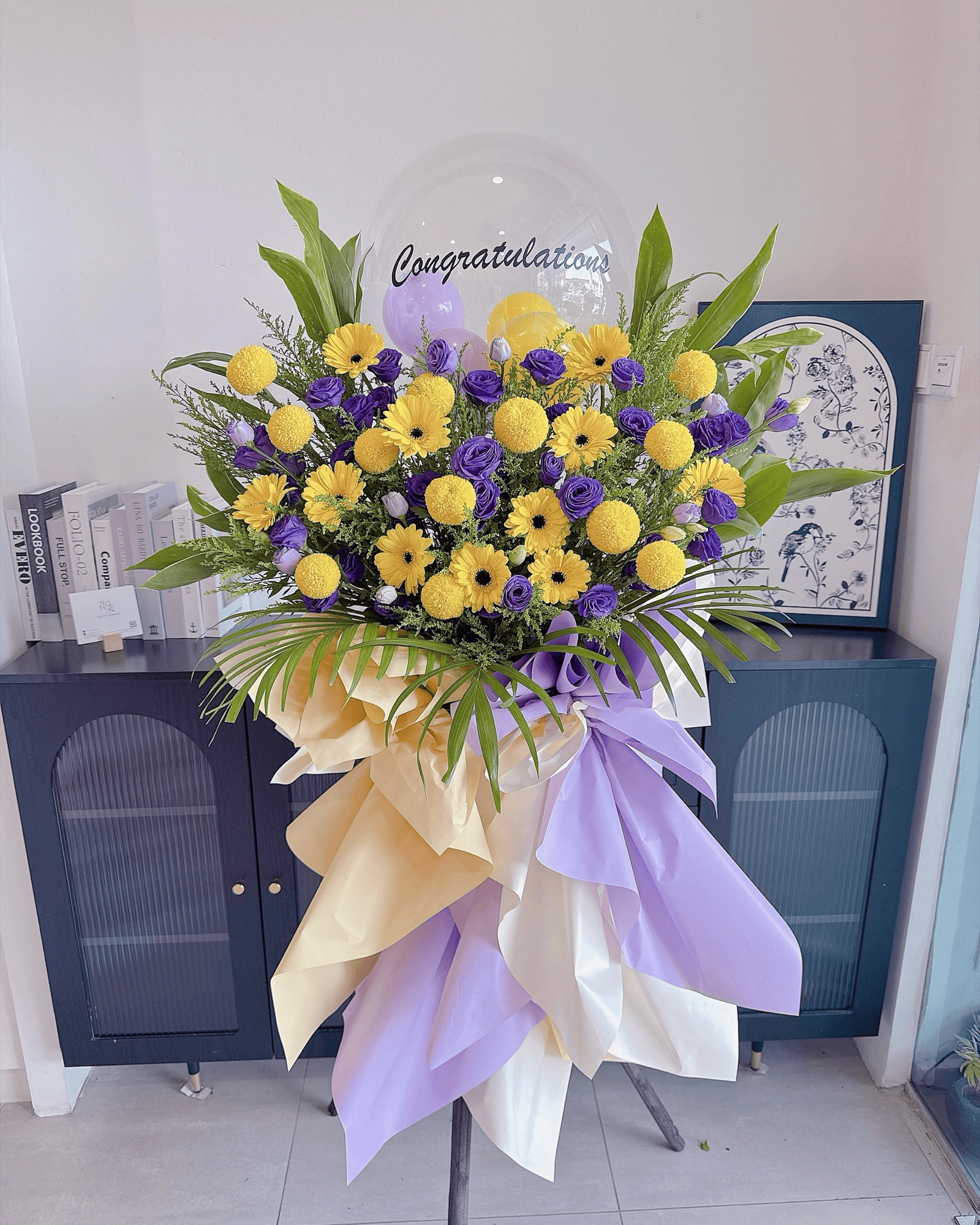 seven-florist-violet-citrine-congratulations-flower-wrap-01.jpg Yellow gerbera purple eustoma congratulations flower stand Seven Florist Puchong