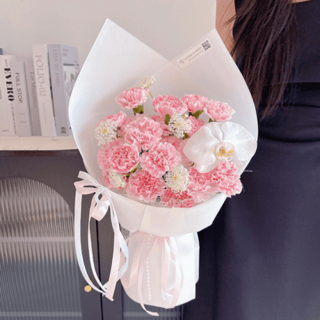 Pink carnation hand bouquet with phalaenopsis birthday gift Seven Florist
