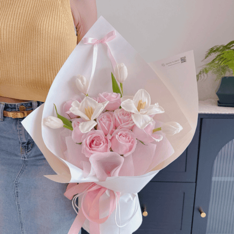 Pink roses and white tulips hand bouquet Seven Florist — birthday anniversary gift
