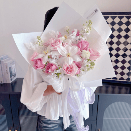Pink purple rose hand bouquet with hydrangea and tulips Seven Florist